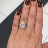3 Ctw Pear-Cut Halo Engagement Ring in 18K Gold