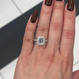 3 Ctw Emerald-Cut Halo Engagement Ring in 18K Gold